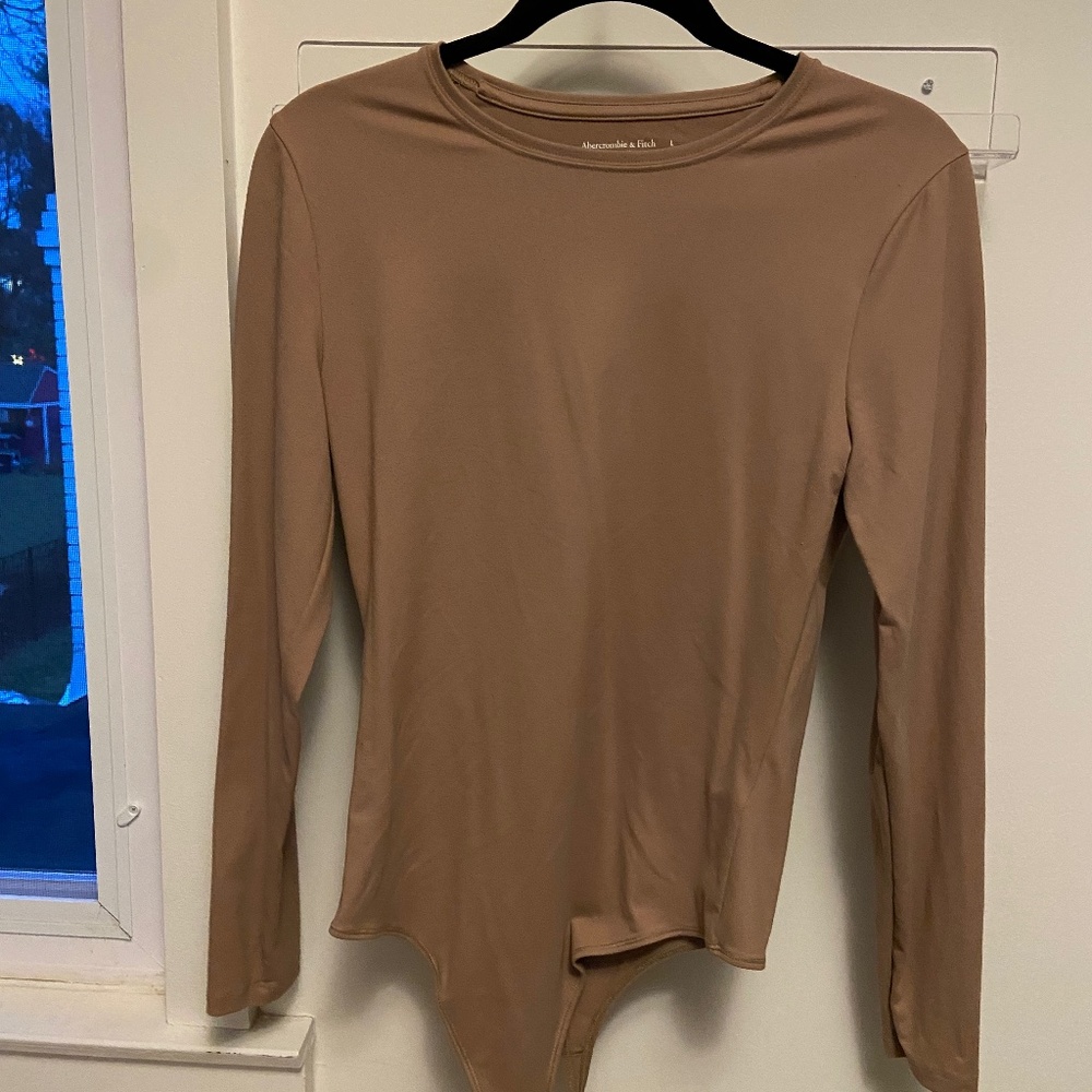 Nude body suit